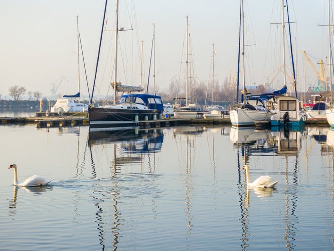 Many boats and yachts anchored at the touristic port or harbor in Mangalia, Constanta