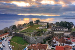 Photo of a small island with a fortress at the coast of Nafplio ,Greece.