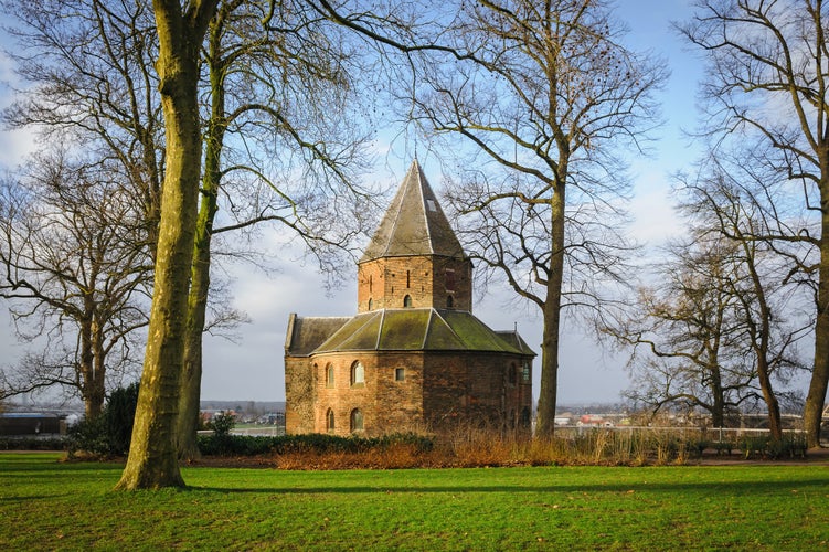 Saint Nicolas Church (Sint Nicolaas Kapel) in Park Valkhof, with the bridge Waalbrug in Nijmegen, the Netherlands