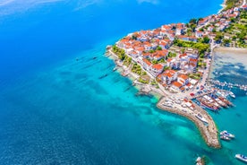 Photo of aerial view of Stobrec popular touristic destination on Adriatic sea, suburb of city of Split, Croatia.