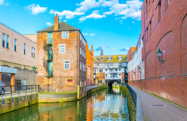 River Witham passes old wooden buildings in central Lincoln, England