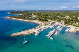 Photo of aerial view of town of Rovinj historic peninsula , famous tourist destination in Istria region of Croatia.