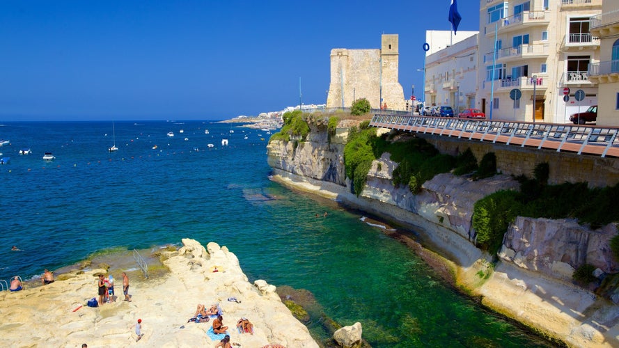 St Paul's Bay, Malta -  The Wignacourt Tower also known as St Paul's Bay Tower, built in 1610 by the Knights of St John and apartments overlooking the bay.