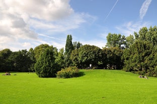 Panoramic view of historic Zurich city center with famous Fraumunster, Grossmunster and St. Peter and river Limmat at Lake Zurich on a sunny day with clouds in summer, Canton of Zurich, Switzerland