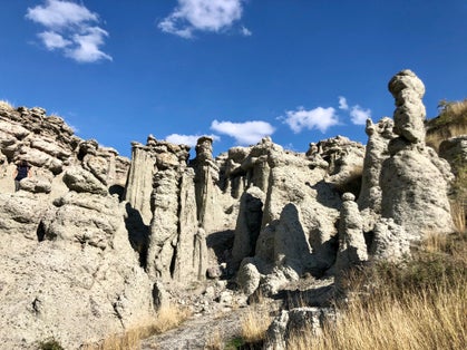 Photo of landscape with rock formation The Stone Dolls (Kameni kukli) of Kuklica near town of Kratovo, Republic of Macedonia.