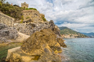 Photo of beautiful street and traditional buildings of Savona, Liguria, Italy.