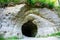 Photo of the entrance to The Helme Caves, Estonia.