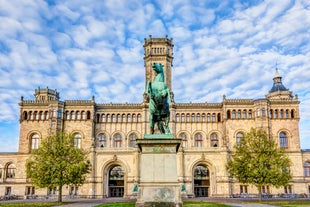 Photo of beautiful panoramic view of historic Bremen Market Square in the center of the Hanseatic City of Bremen with The Schuetting and famous Raths buildings on a sunny day with blue sky in summer, Germany.