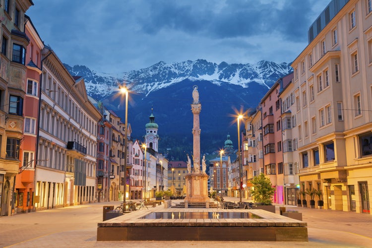 photo of Innsbruck, Austria during twilight with European Alps in the background.