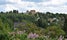 Historical Kongsvinger Fortress castle mountain nature and landscape - panorama environment scenery - sunny blue sky, white clouds and summer season - Kongsvinger, Norway