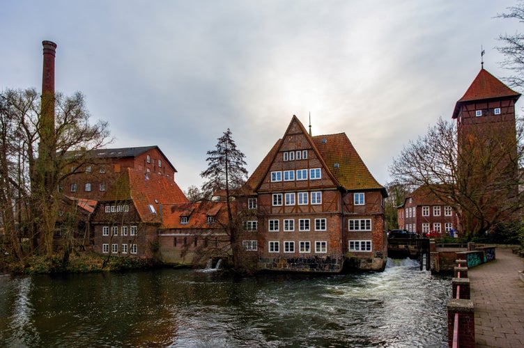 Photo of tower on Ilmenau river at morning in Luneburg. Germany