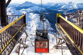 photo of the romantic, Snow covered Skiing Resort of Cortina d Ampezzo in the Italian Dolomites seen from Tofana with Col Druscie in the foreground.