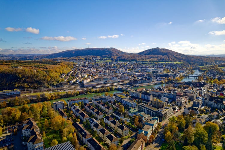 Photo of aerial view of city of Olten on a blue cloudy autumn day with beautiful autumn landscape scenery, Switzerland.