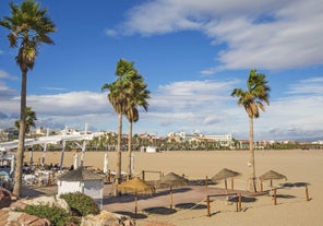 Photo of aerial view of beach and cityscape Salou, Spain.