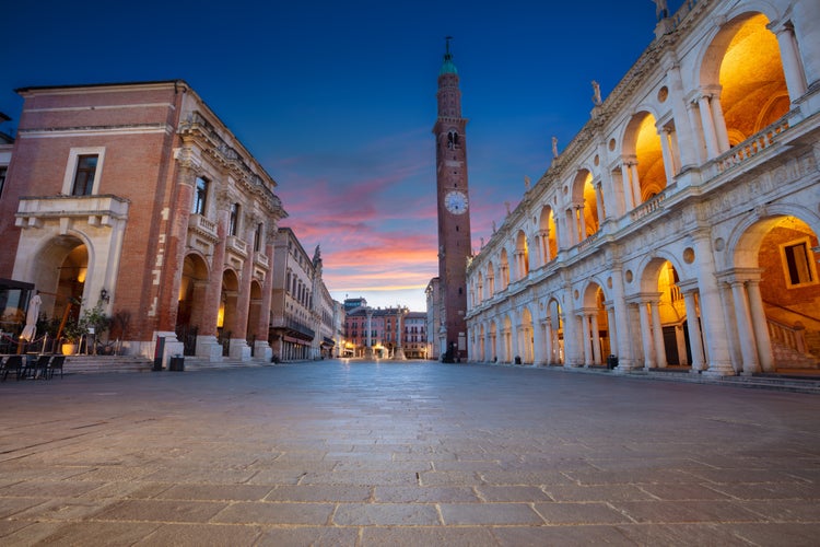 Photo of historical centre of Vicenza, Italy with old square ( Piazza dei Signori) at sunrise.