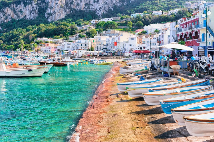 Photo of Boats at Marina Grande embankment in Capri Island in Tyrrhenian sea, Italy.