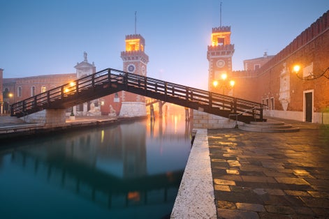 photo of view Venice, Italy at the Venetian Arsenal on a foggy morning, Venice, Italy.