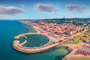 photo of aerial landscape photography of splendid summer view from flying drone of Montesilvano public beach. Wonderful morning seascape of Adriatic Sea in Italy, Europe.