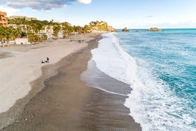 Photo of an aerial view of a mediterranean spanish beach (San Cristobal beach) at Almunecar, Granada, Spain.