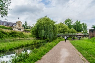 Photo of Metz city view of Petit Saulcy an Temple Neuf and Moselle River in Summer, France.