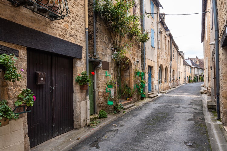 Photo of Rustic village street of Montignac.