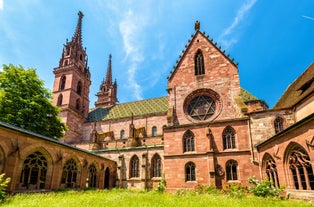 View of the Old Town of Basel with red stone Munster cathedral and the Rhine river, Switzerland.