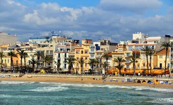 Photo of aerial view of coast at Calafell cityscape with modern apartment buildings, Spain.