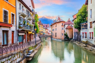 Photo of morning cityscape view with mountains, river and bridge in Grenoble city on the south-east of France.