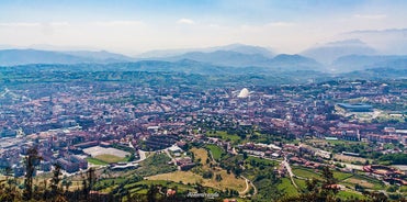 Photo of aerial panoramic view of Lugo galician city with buildings and landscape, Spain.