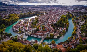 Panoramic view of historic Zurich city center with famous Fraumunster, Grossmunster and St. Peter and river Limmat at Lake Zurich on a sunny day with clouds in summer, Canton of Zurich, Switzerland