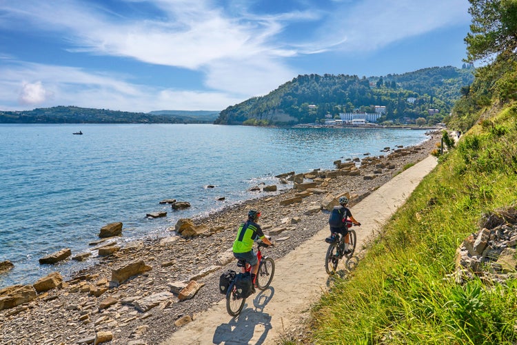 active senior couple on a mountain bike tour at Capodistria, Slovenian Mediterranen cost near Izola and Koper