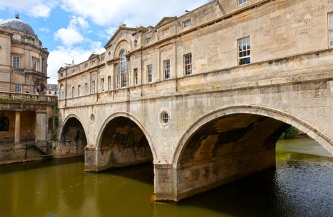 Photo of a close up of the Pulteney Bridge on River Avon in Bath, England.