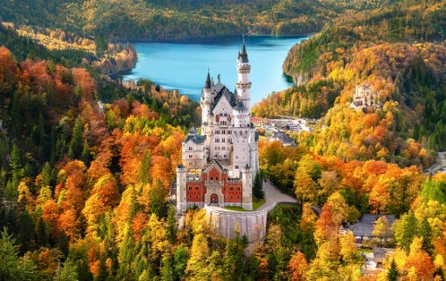 Photo of aerial view of Neuschwanstein Castle ,Autumn in the Bavarian Alps, the jewel of Germany.