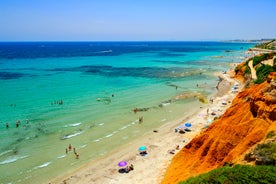 photo of aerial panoramic drone point of view Cabo Roig coastline with blue Mediterranean Seascape view, residential buildings near sandy beach at sunny summer day. Province of Alicante, Costa Blanca. Spain.