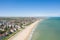 Photo of aerial view of the long sandy beach of Sword beach in Hermanville-sur-Mer towards Ouistreham ,France.