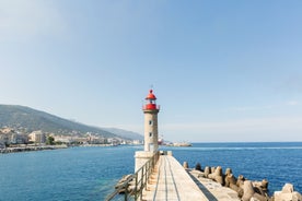 Photo of colorful houses on the shore of Bastia port, bright morning view of Corsica island, France.