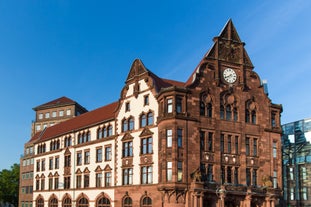 Photo of beautiful panoramic view of historic Bremen Market Square in the center of the Hanseatic City of Bremen with The Schuetting and famous Raths buildings on a sunny day with blue sky in summer, Germany.