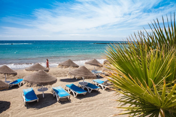 Photo of beautiful sandy beach in Adeje Playa de las Americas on Tenerife, Spain.