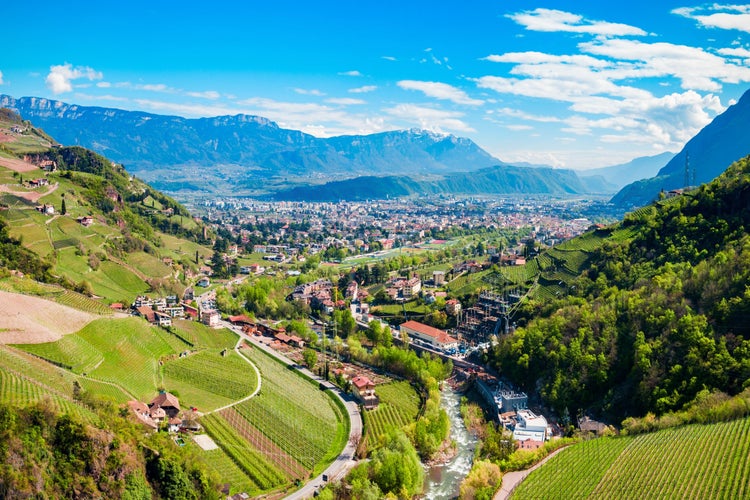 Bolzano and Dolomite mountains aerial panoramic view. Bolzano is the capital city of the South Tyrol province in northern Italy.