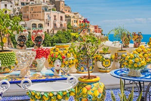 Photo of aerial morning view of Amalfi cityscape on coast line of Mediterranean sea, Italy.