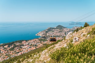 Photo of panoramic aerial view of the old town of Dubrovnik, Croatia seen from Bosanka viewpoint on the shores of the Adriatic Sea in the Mediterranean Sea.