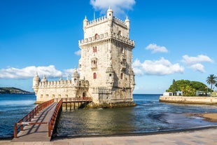 Photo of Lisbon City Skyline with Sao Jorge Castle and the Tagus River, Portugal.