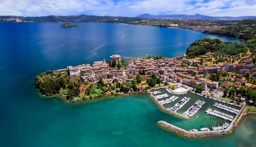 Scenic lakes of Italy - beautiful Bolsena. aerial view of Capodimonte medieval village. Viterbo province, Lazio region