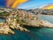 Photo of beautiful sunset over ulcinj is town on coast of Montenegro, aerial view on Ada Bojana Island and old Ulcinj Castle.