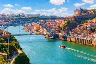 Photo of Lisbon City Skyline with Sao Jorge Castle and the Tagus River, Portugal.