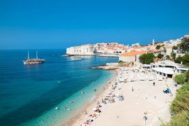 Photo of panorama and landscape of Makarska resort and its harbour with boats and blue sea water, Croatia.