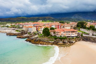 Photo of Ballota beach with the islet Castro, Llanes,  Spain.