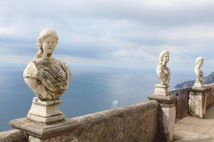 photo of Positano Amalfi Coast Italy Landscape Sunny and happiness view sea water blue and sky Italian village Ravello Nocelle Cinque terre pizza.