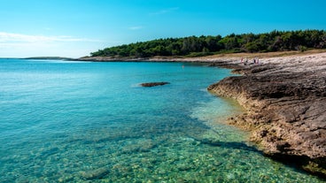 Photo of aerial view of beautiful town of Medulin waterfront view, Istria region of Croatia.