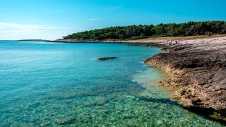 Photo of aerial view of beautiful town of Medulin waterfront view, Istria region of Croatia.